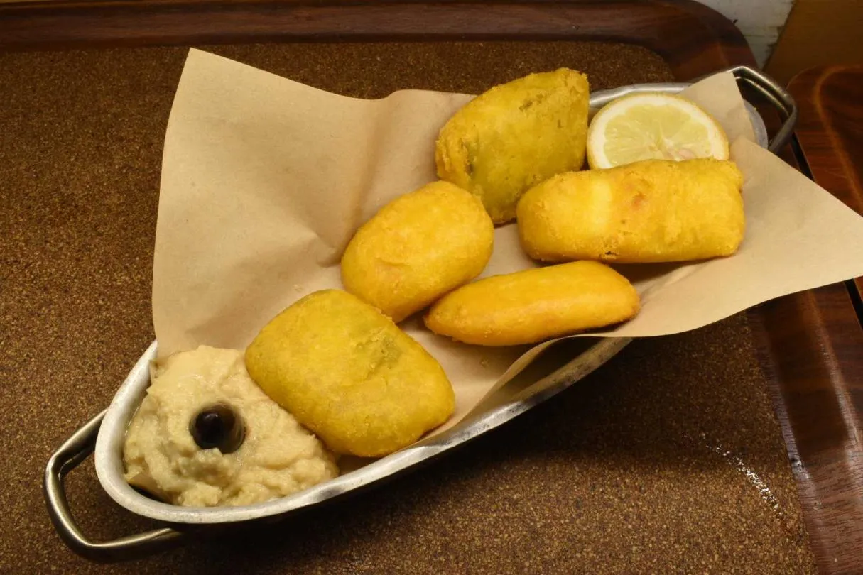 Cod fish croquettes with garlic dip